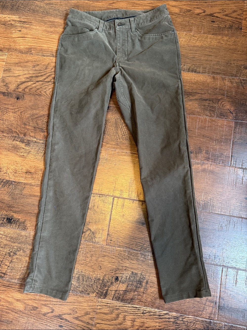 Men’s size 28W 31L Lululemon ABC jeans in a rare olive drab greenish brown color